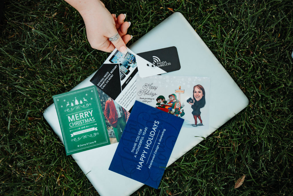 business cards to show how a human graphic designer can help network